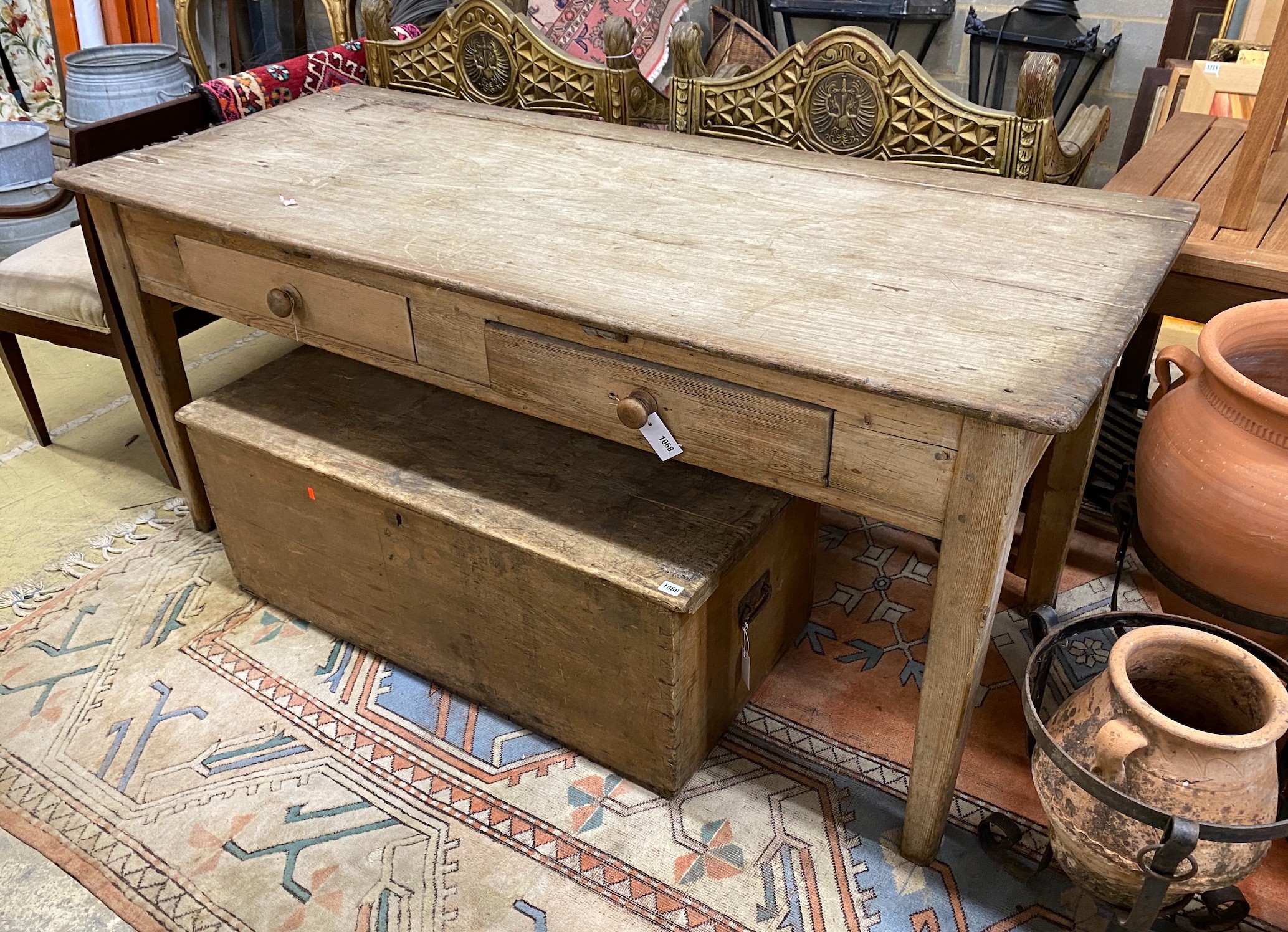 A Victorian two drawer pine kitchen serving table, length 180cm, depth 77cm, height 80cm